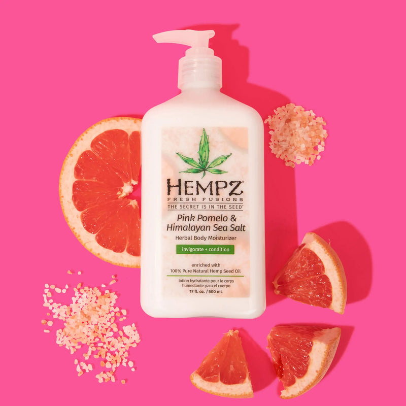 Hempz Fresh Fusions Pink Pomelo & Himalayan Sea Salt Herbal Body Moisturizing Lotion with slices of grapefruit and sea salt
